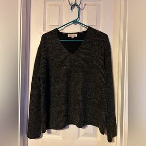 Philosophy black sweater size L with hints of sparkle